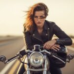 Woman rider on vintage bike needing one day bike insurance cover